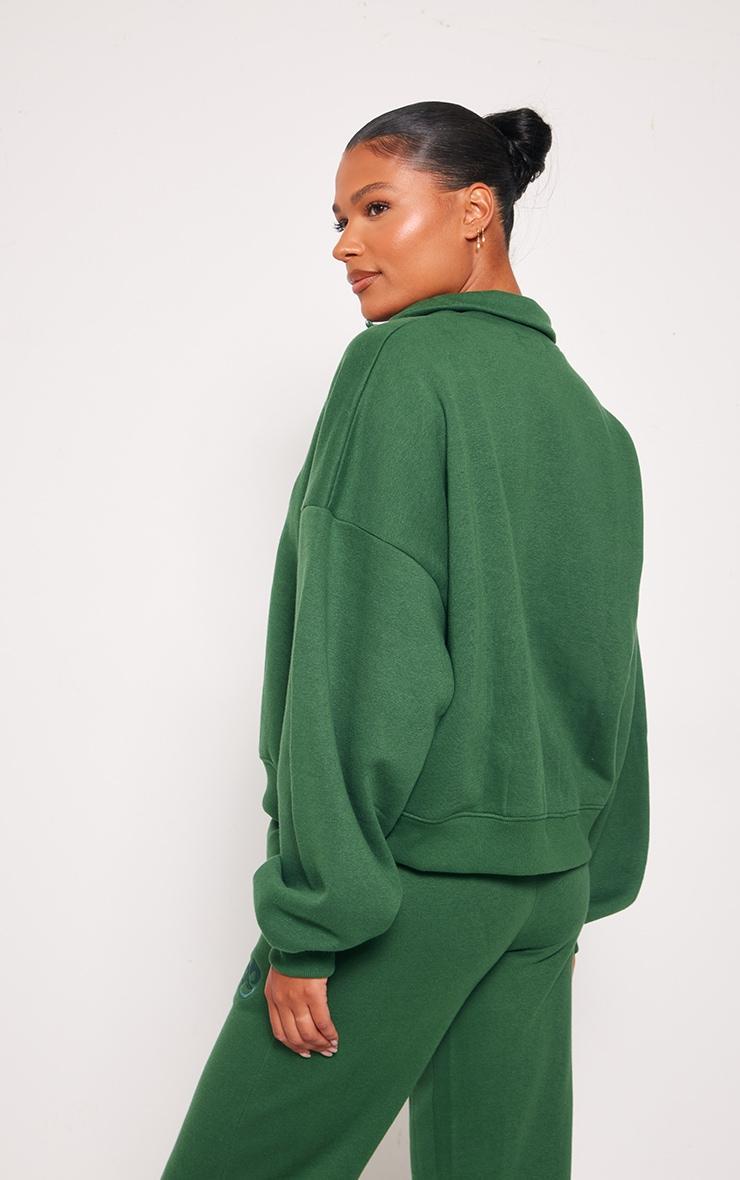 PRETTYLITTLETHING Forest Green Logo Embroidered Half Zip Sweatshirt Product Image