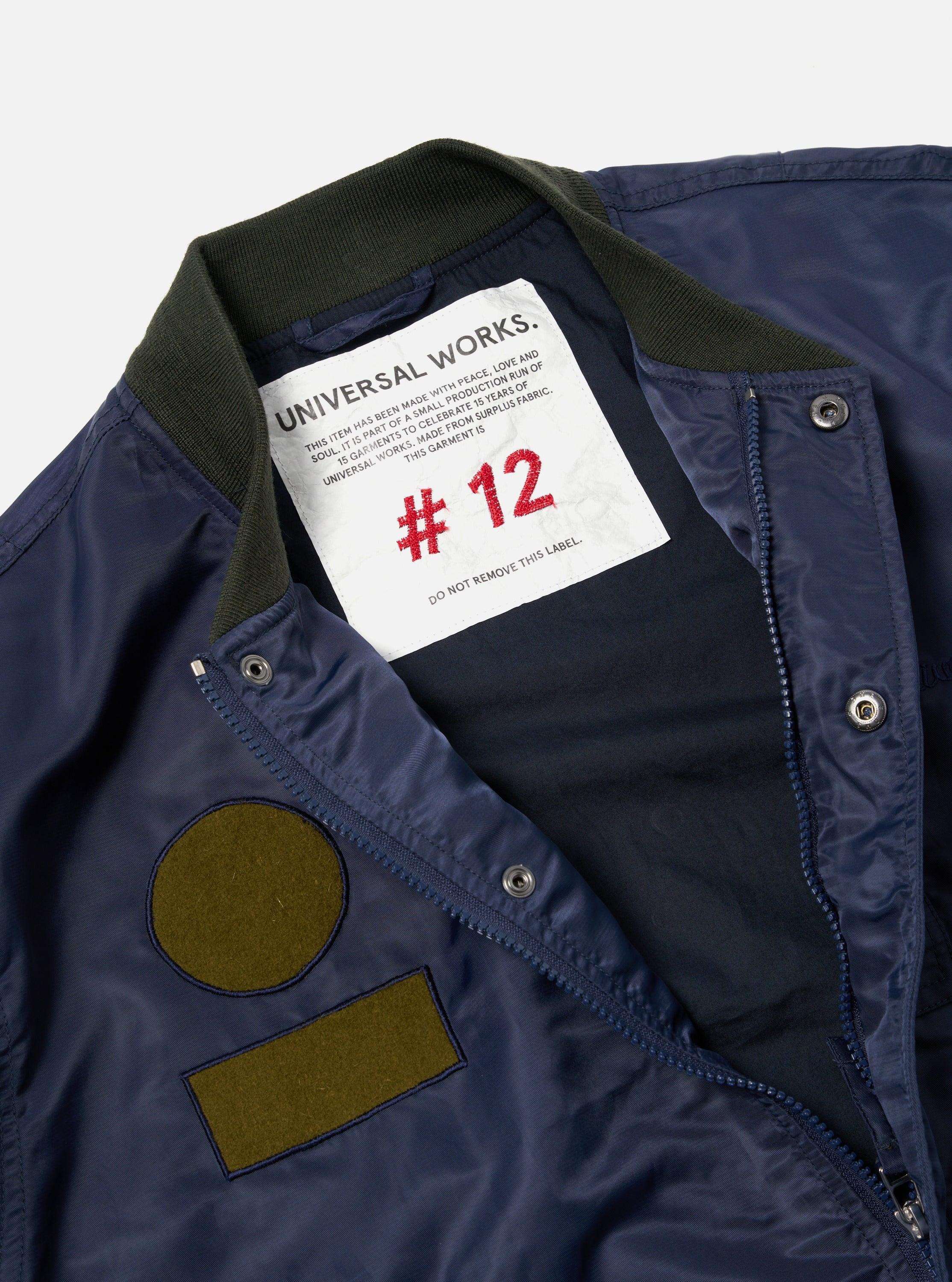 Universal Works Badge Bomber in Olive/Navy Flight Nylon Product Image