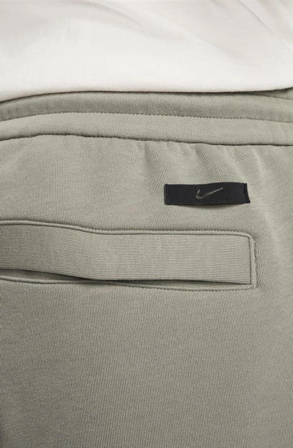 Men's  Sportswear Tech Fleece Reimagined Loose Fit Open Hem Sweatpants In Grey Product Image