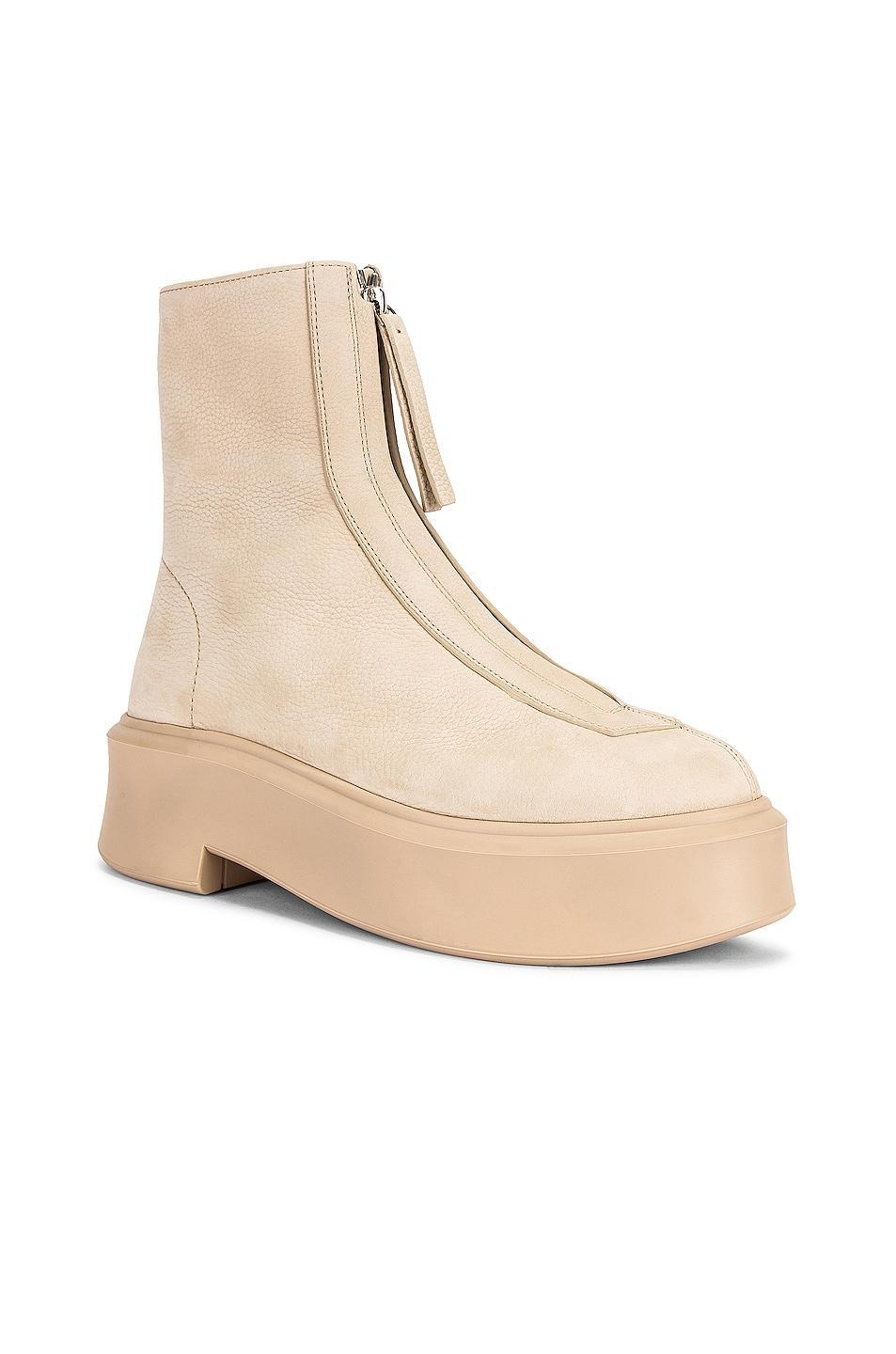 The Row Zipped Booties in Beige - Beige. Size 40.5 (also in 35.5, 40, 41). Product Image