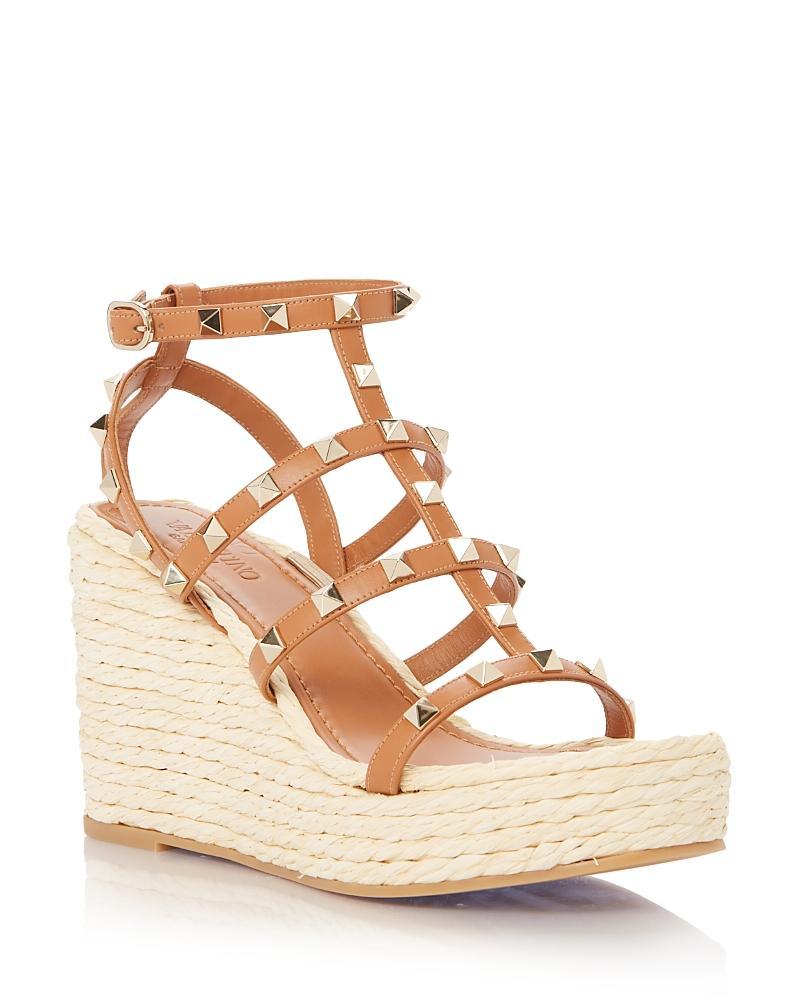 Valentino Garavani Rockstud Espadrille Wedge in Almond Beige & Naturale - Beige. Size 37 (also in 39, 41). Product Image