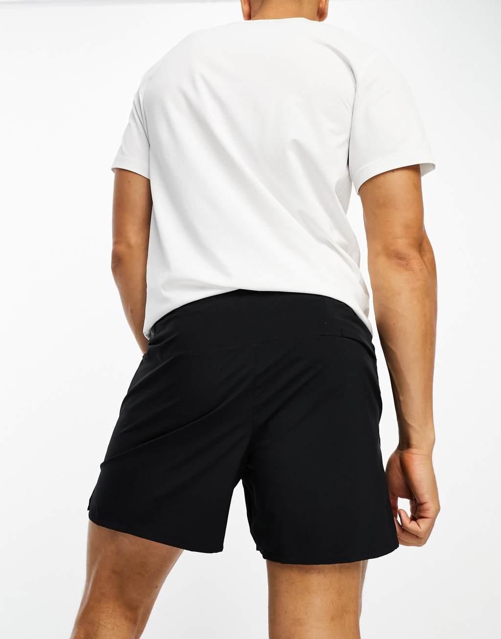 Nike Training Dri-FIT 5inch shorts in black Product Image