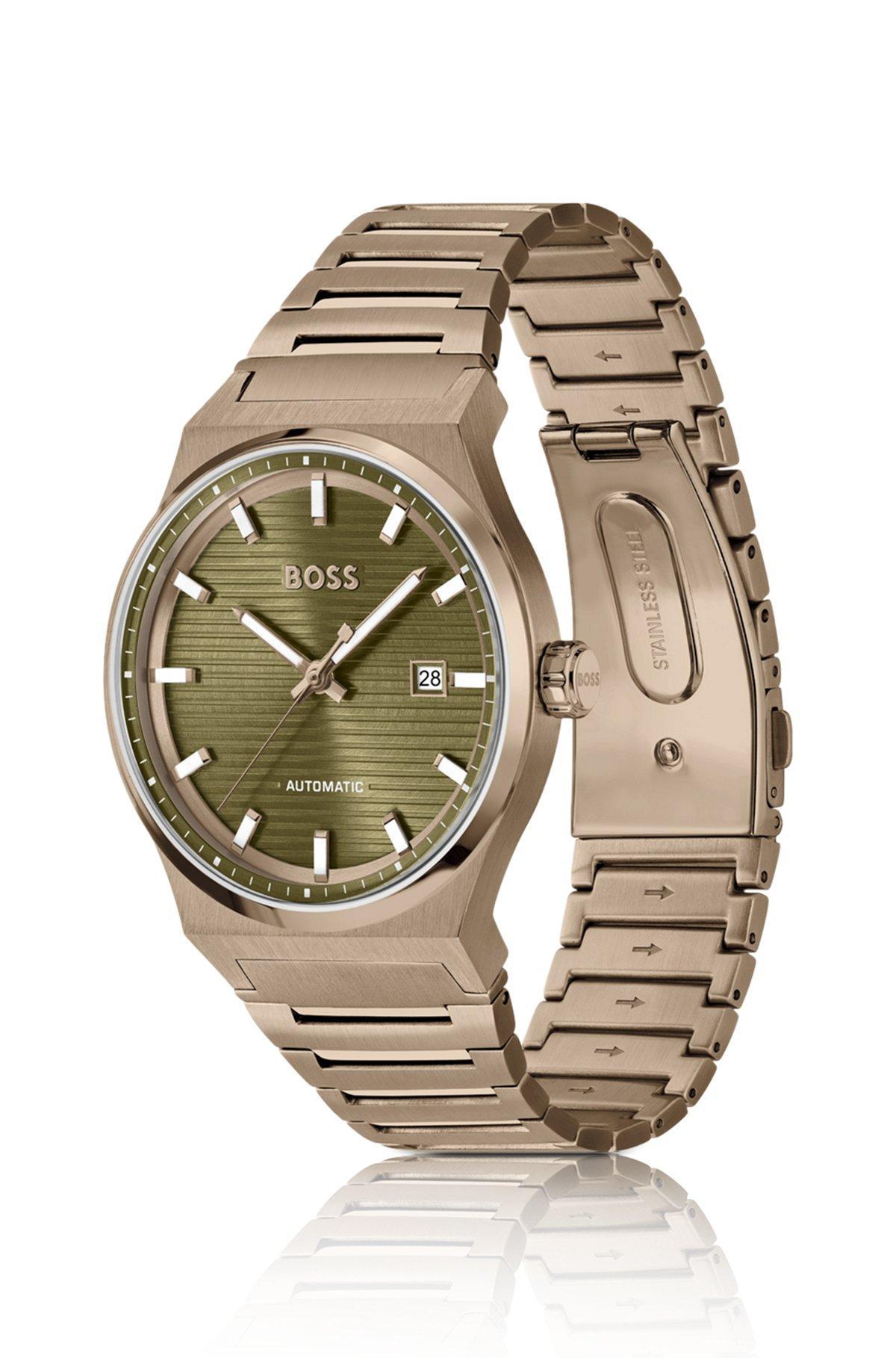 Gold-tone automatic watch with grooved dial Product Image