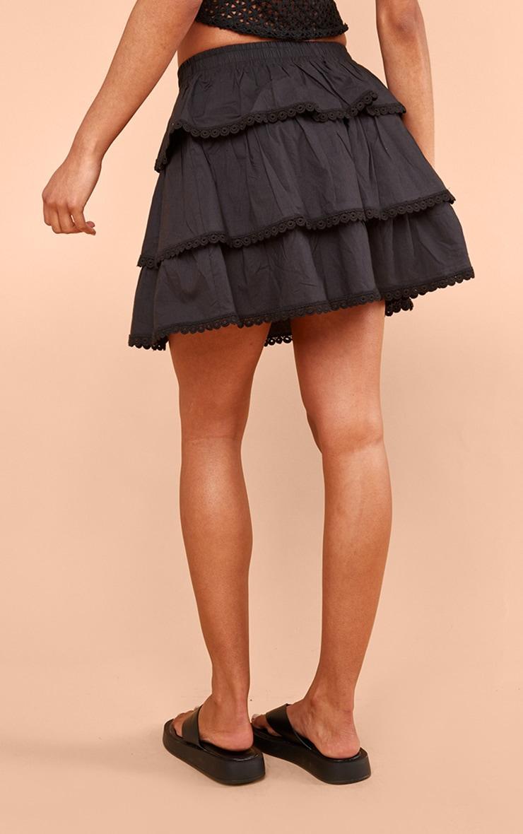 Black Broderie Trim Tiered Mini Skirt Product Image