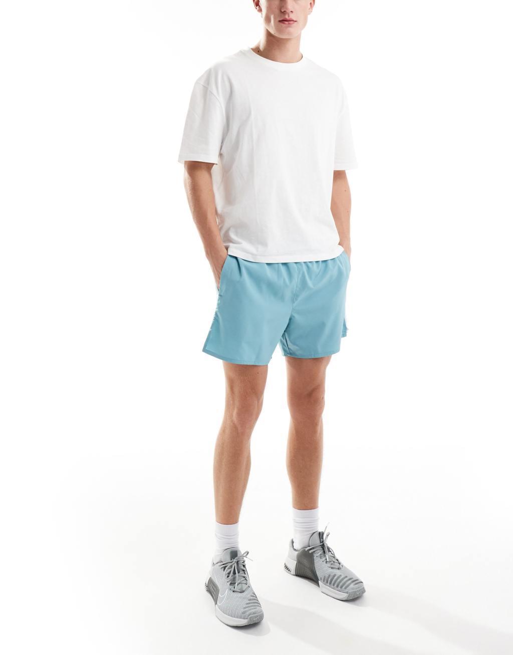 Nike Running Challenger Dri-FIT 5 inch shorts in light blue Product Image