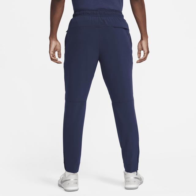 NikeDri-FIT Unlimited Tapered Leg Versatile Training Pants Product Image