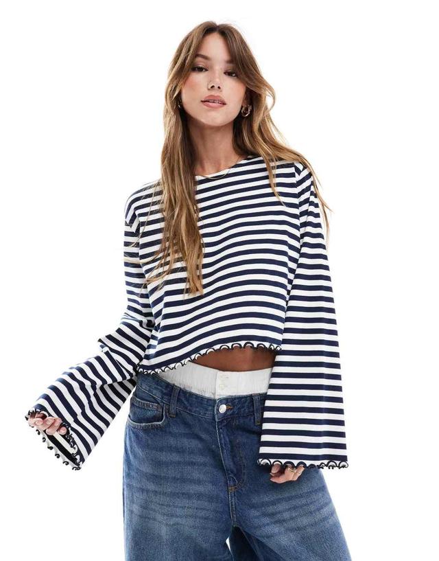 ASOS DESIGN lettuce hem long sleeve T-shirt in white and navy stripe Product Image