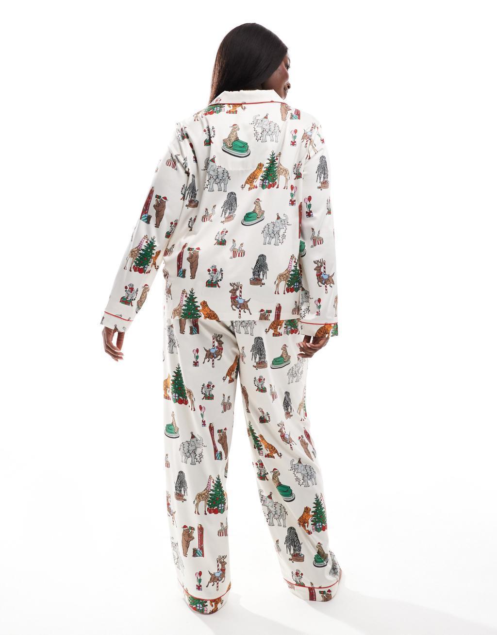 Chelsea Peers Curve Christmas satin circus print long sleeve top and pants pajama set in cream Product Image