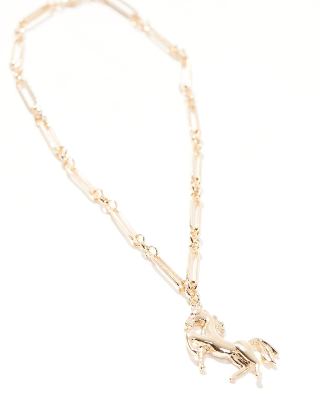 ASOS DESIGN long necklace with horse pendant in gold tone Product Image