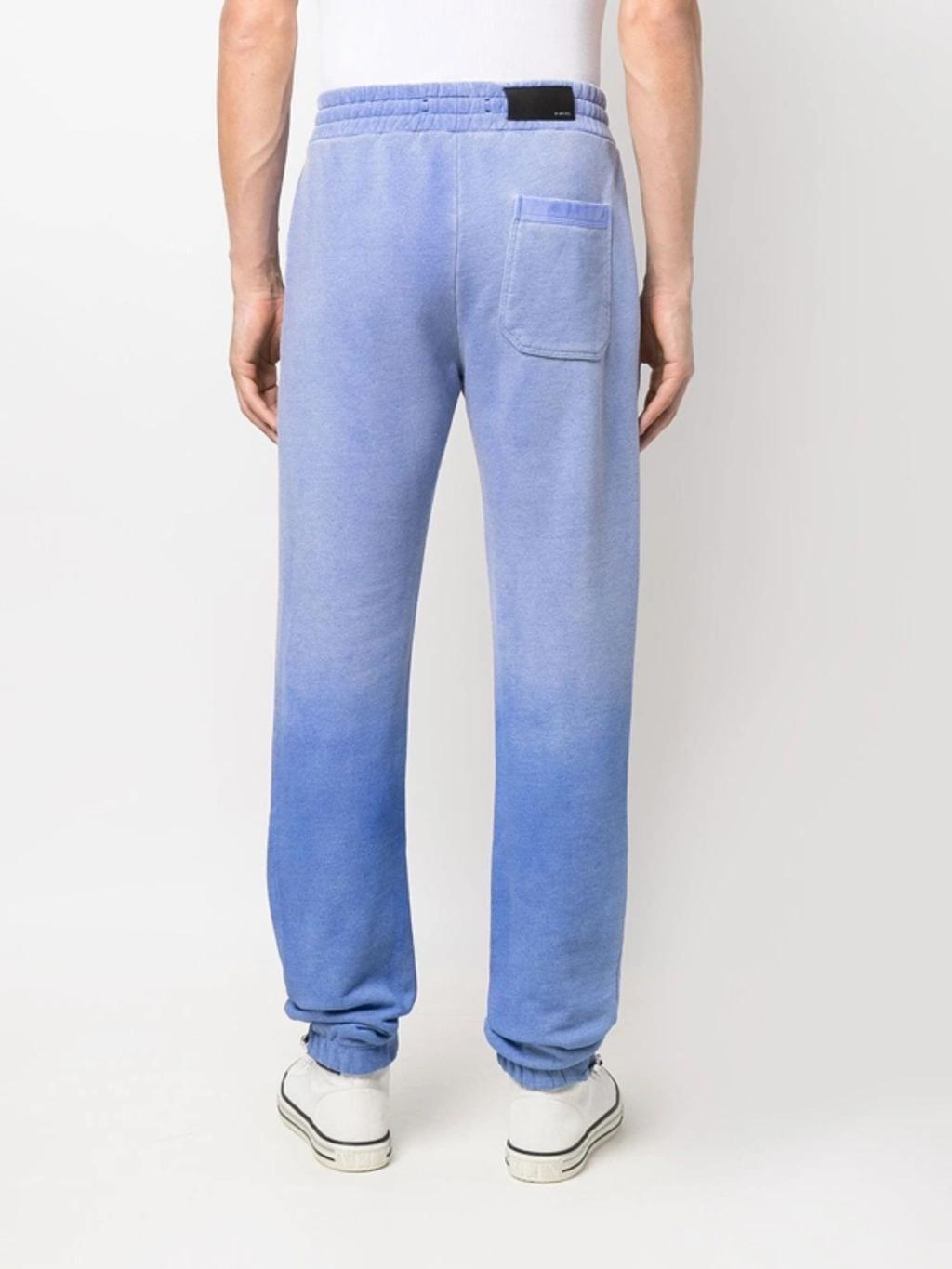 Slim-fit Tapered Logo-embroidered Cotton-jersey Sweatpants In Blue Product Image