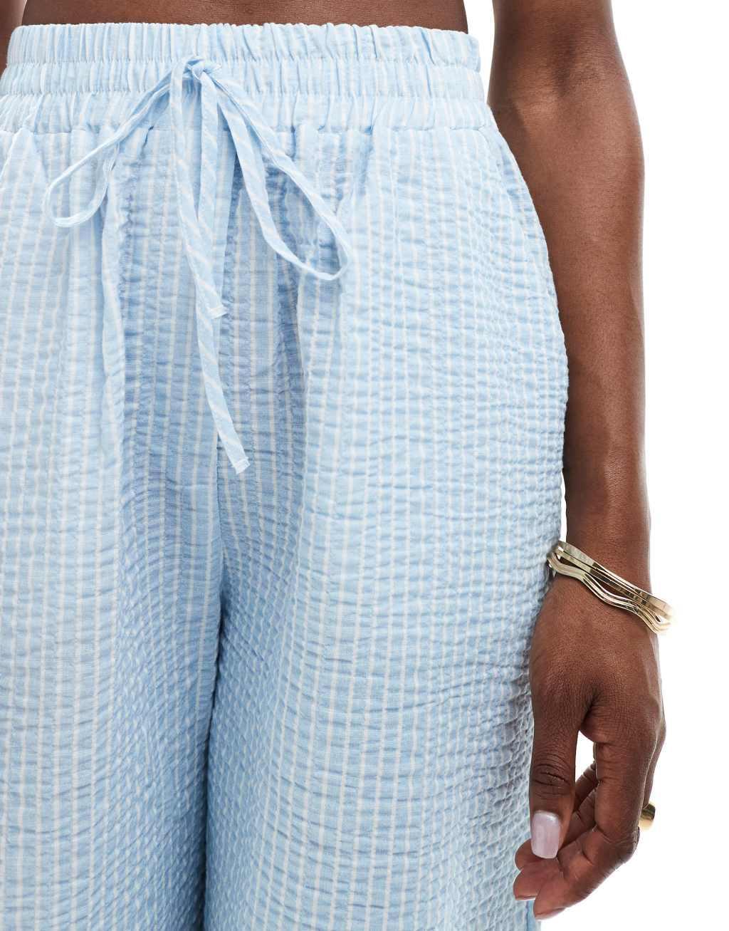 ASOS DESIGN seersucker tie waist wide leg pants in blue & white stripe Product Image