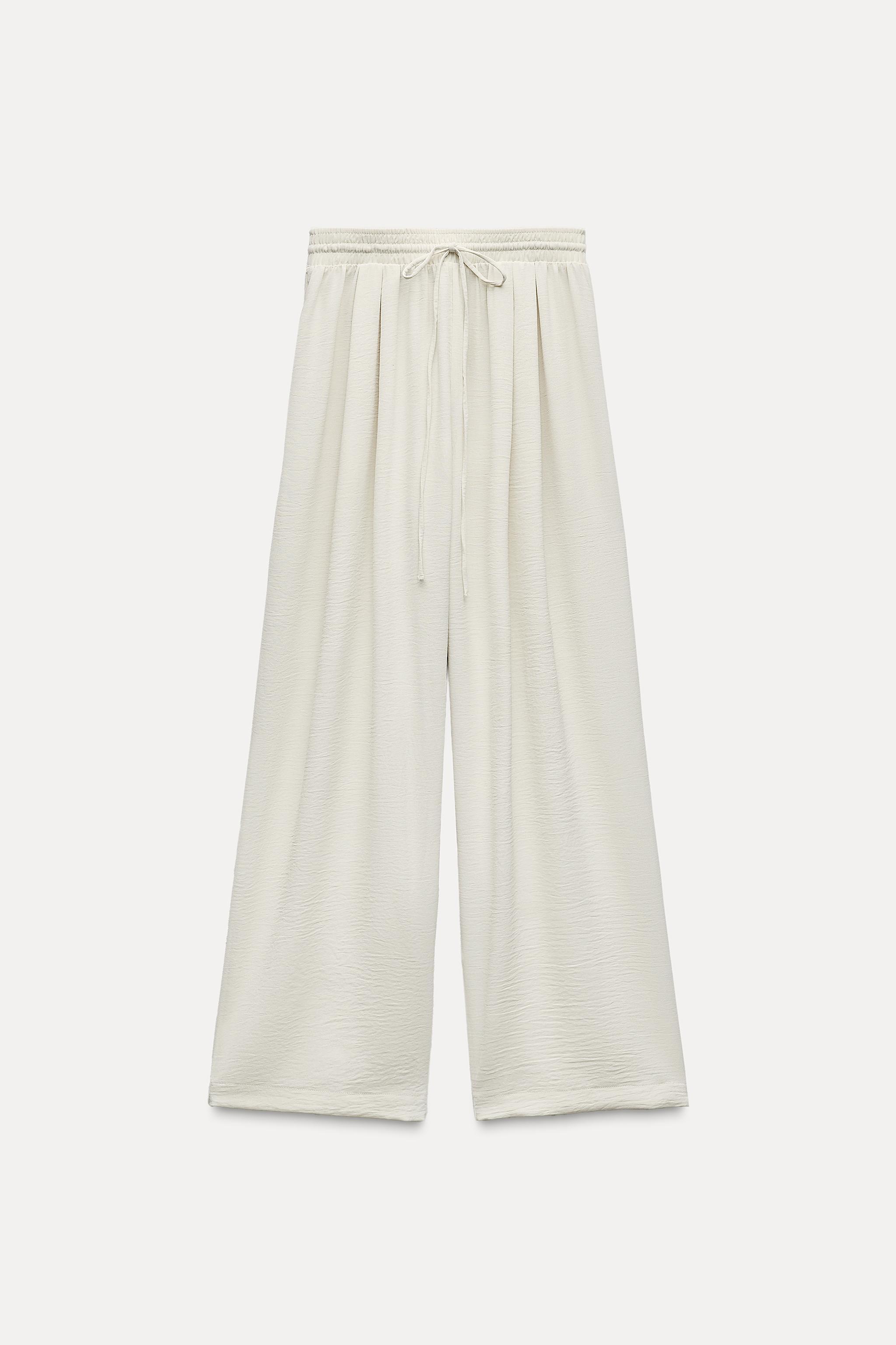 FLOWY PLEATED PANTS Product Image