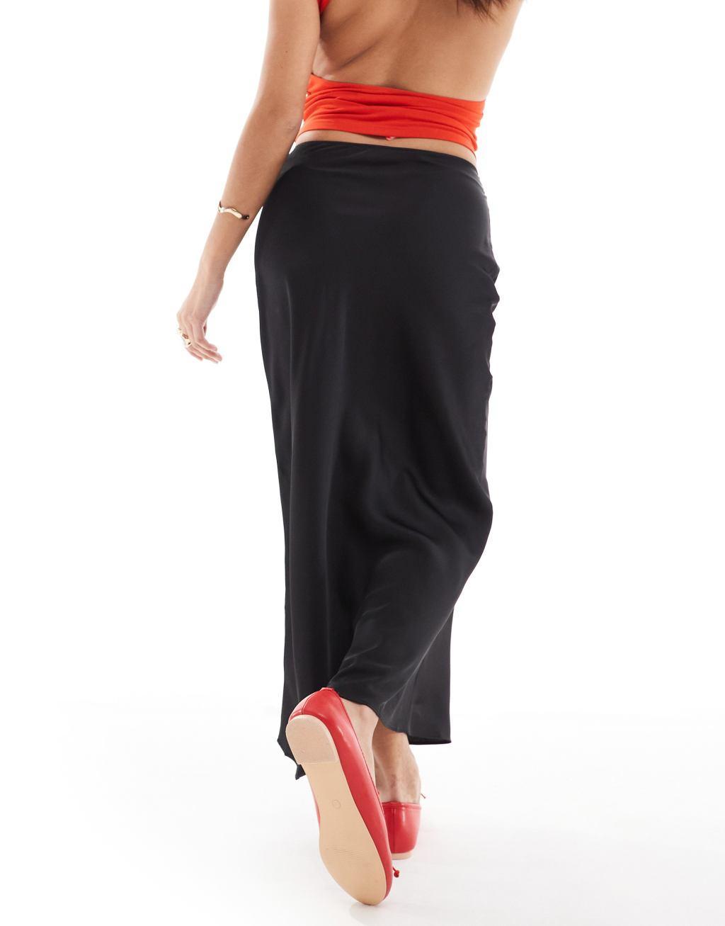 ASOS DESIGN Petite satin bias midi skirt in black Product Image