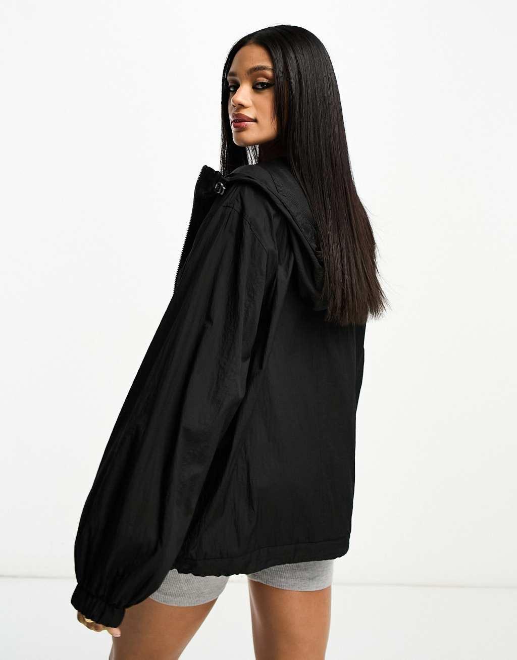 ASOS Weekend Collective rain coat in black Product Image