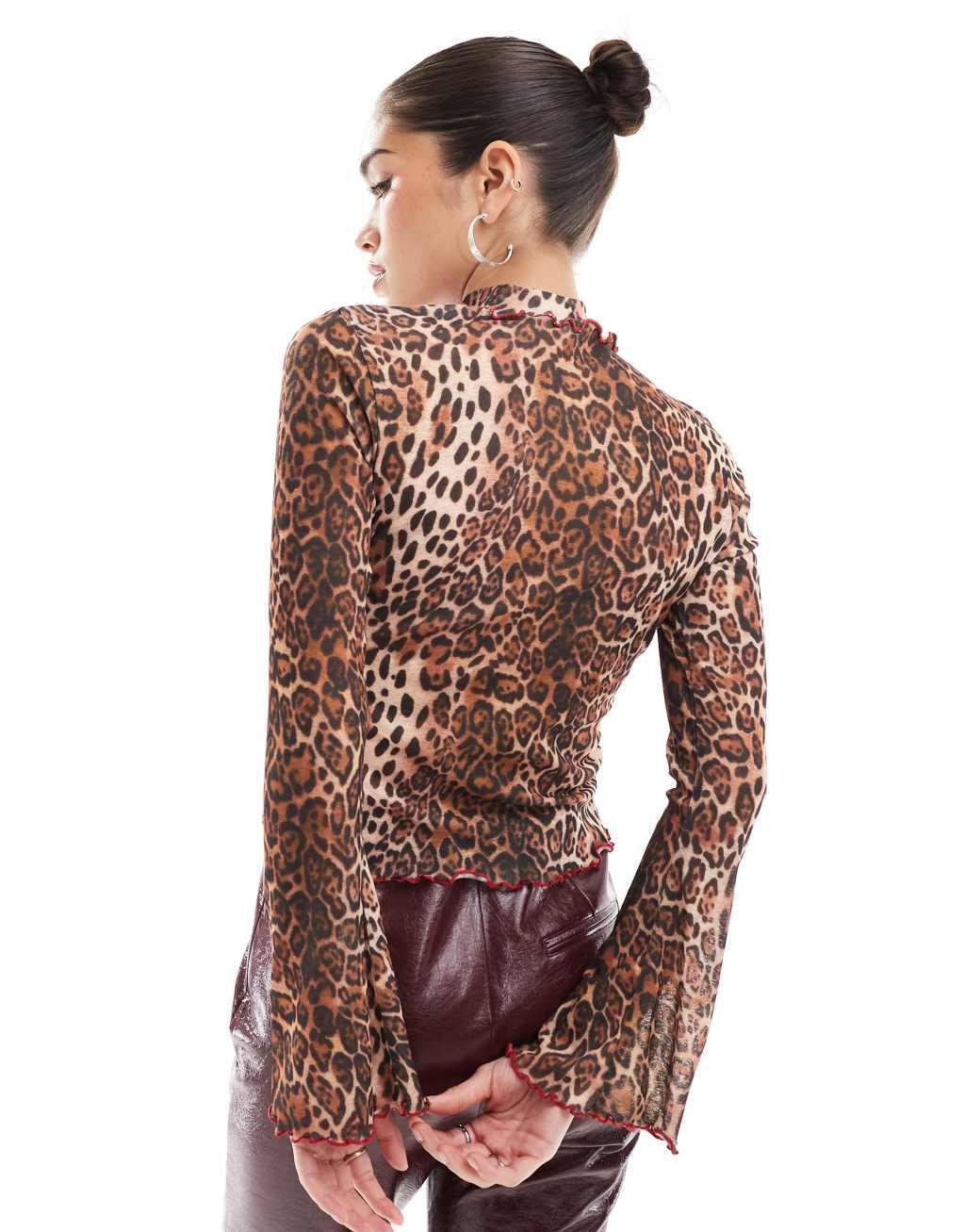 ASOS DESIGN roll neck leopard print top with contrast babylock in brown Product Image