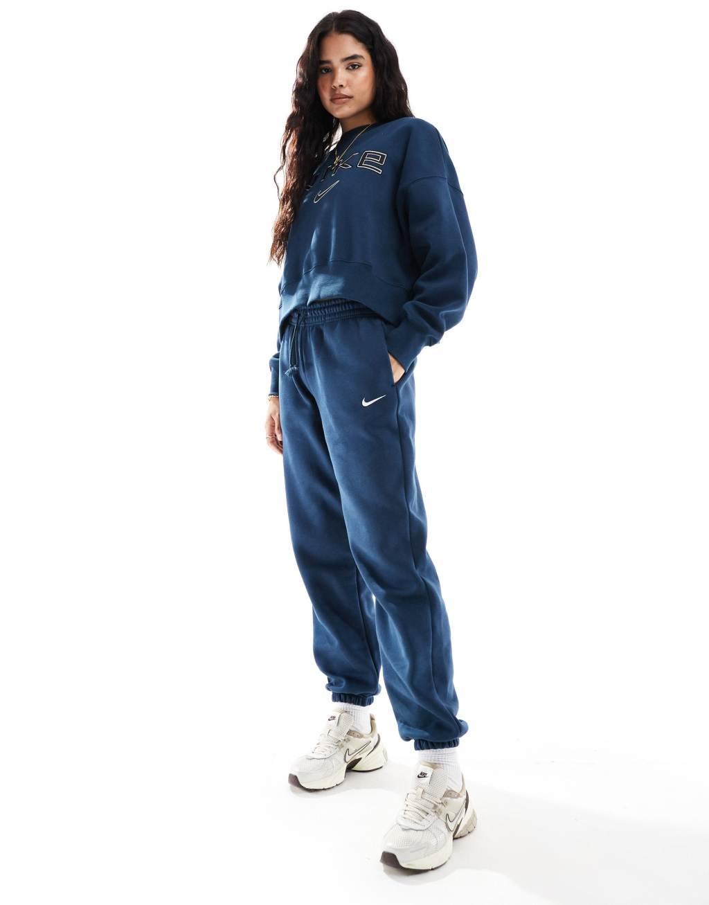 Nike Mini Swoosh sweatpants in navy Product Image