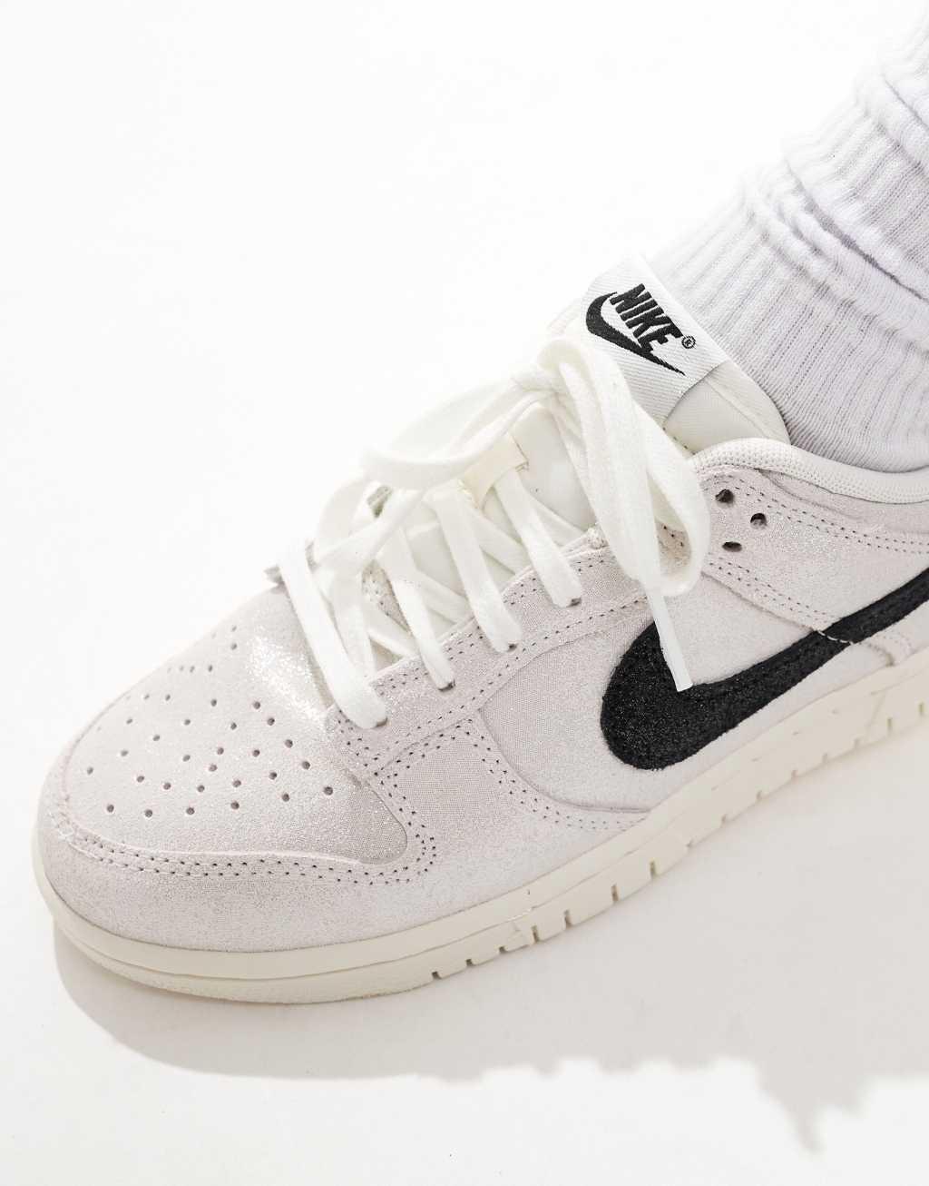 Nike Dunk Low glitter sneakers in white and black Product Image