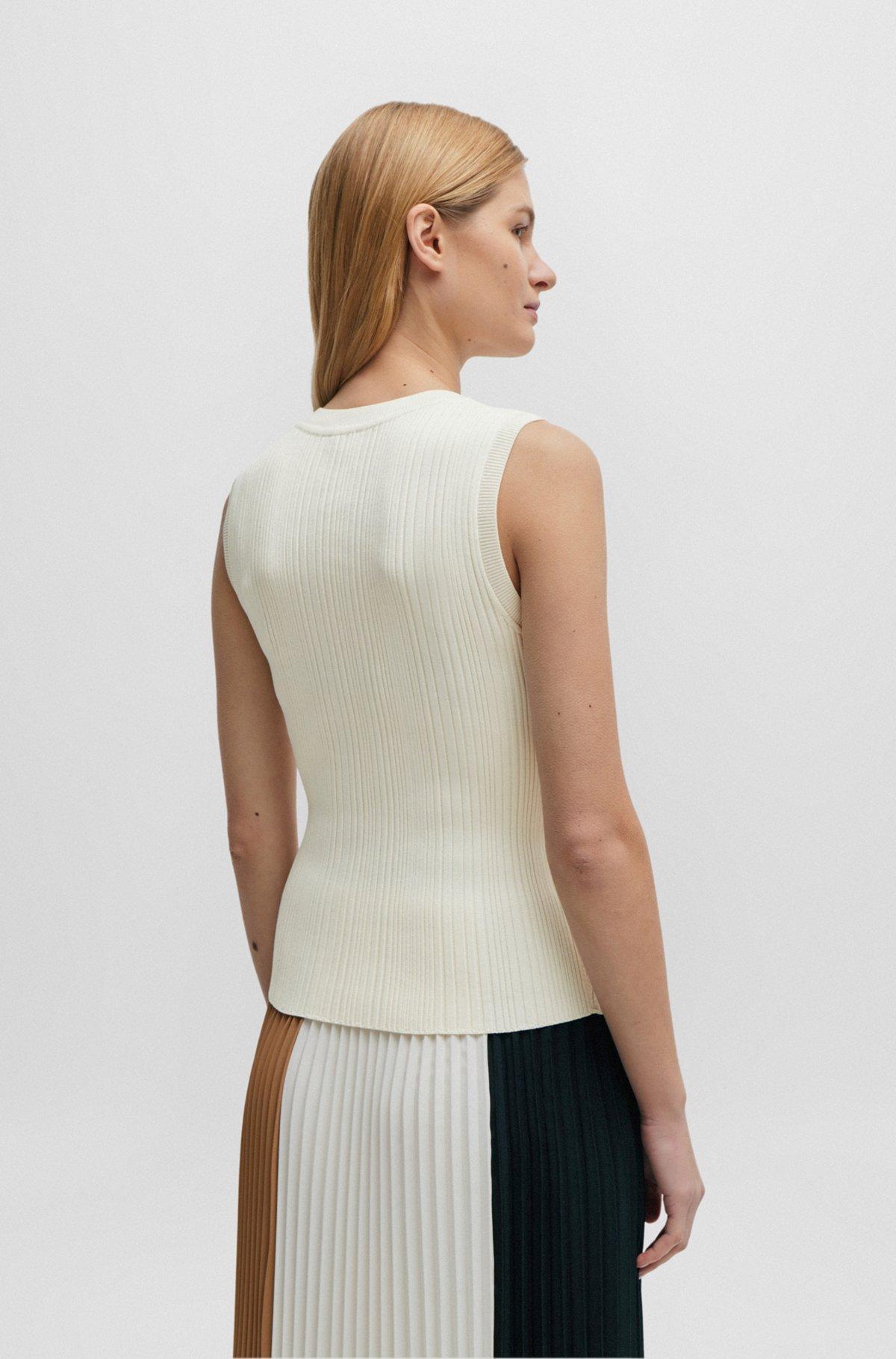 Sleeveless knitted top with ribbed structure Product Image