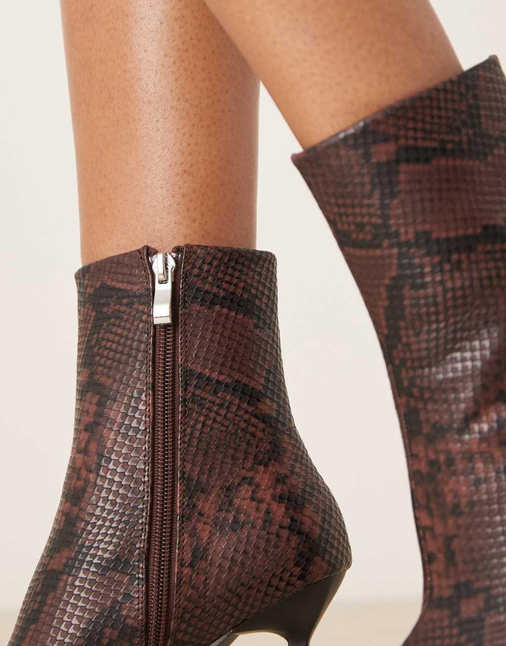 RAID Elvio heeled ankle boots in snake Product Image