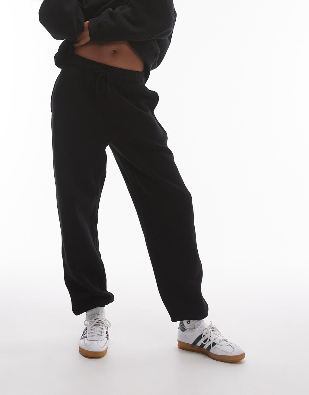 Topshop cuffed sweatpants in black Product Image