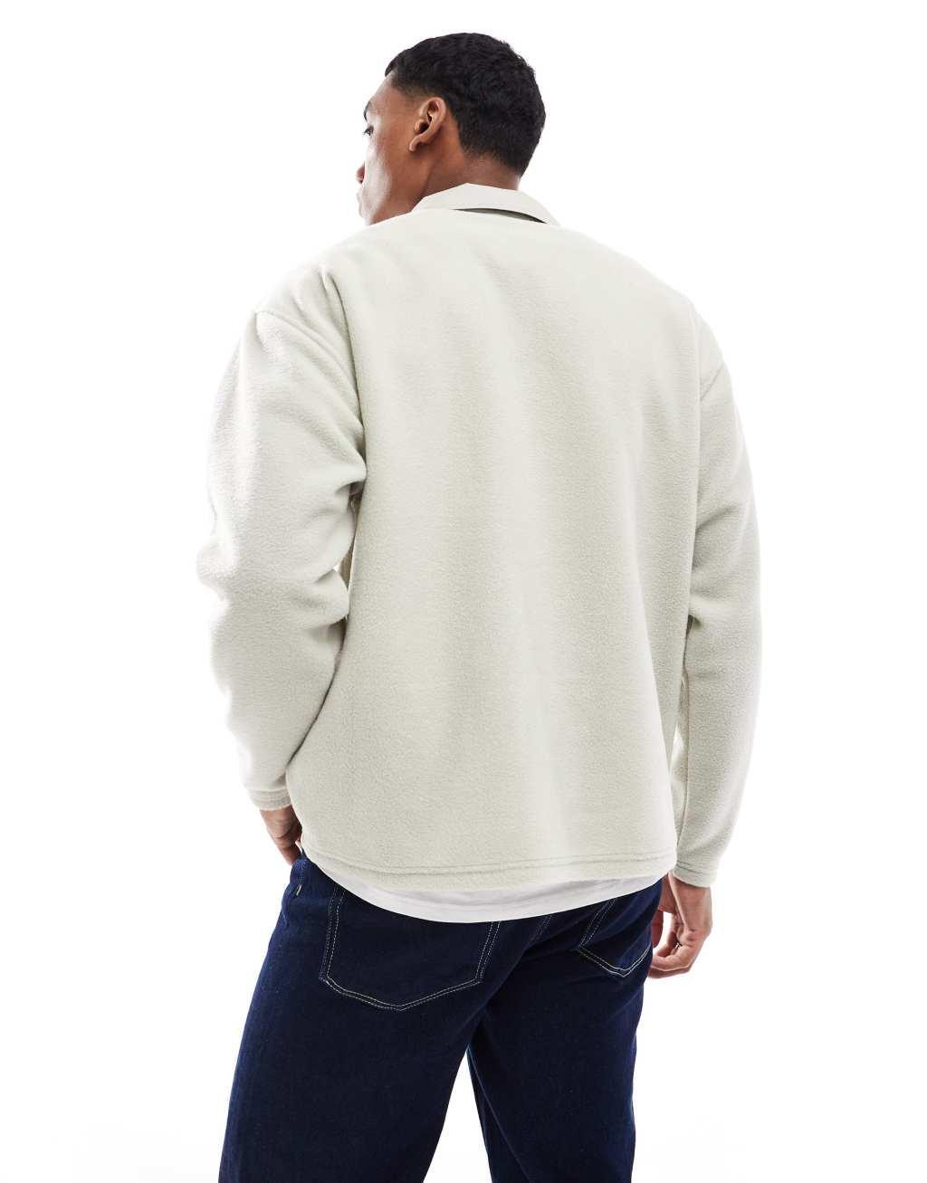 ASOS DESIGN oversized rugby polo fleece sweatshit with half zip in beige Product Image