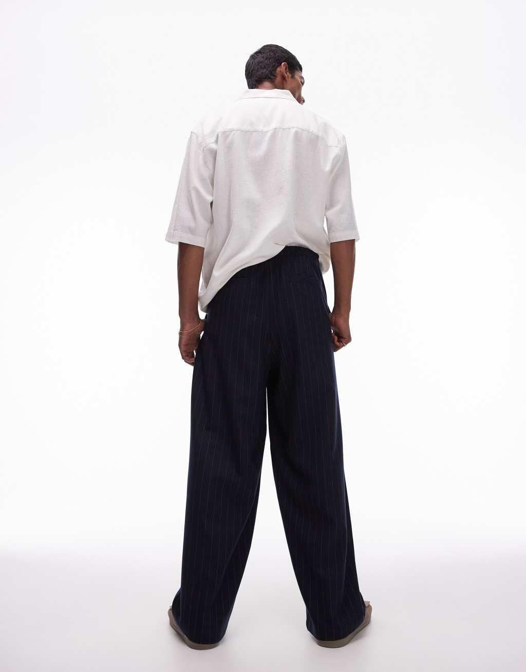 Topman wide leg pin stripe pants in navy Product Image