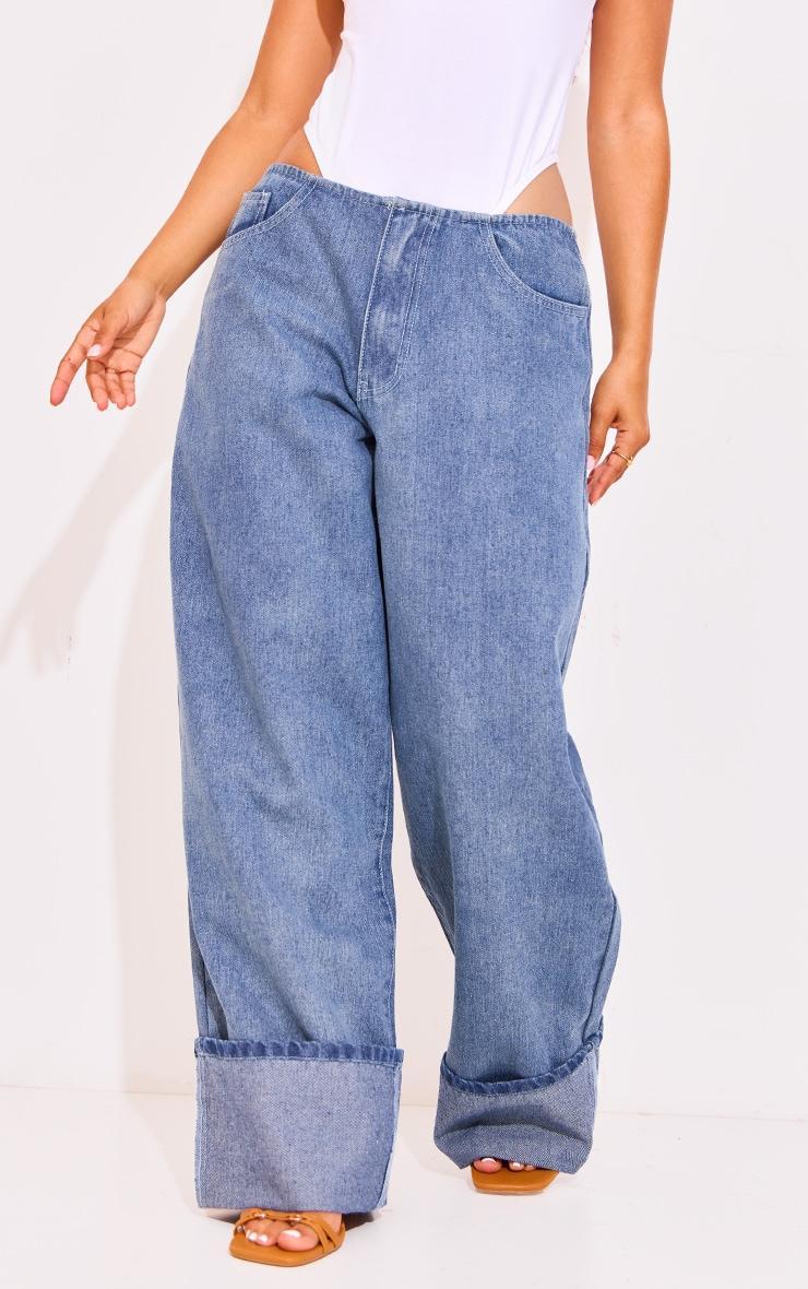 Petite Light Blue Wash Denim Turn Up Low Rise Wide Leg Jeans Product Image