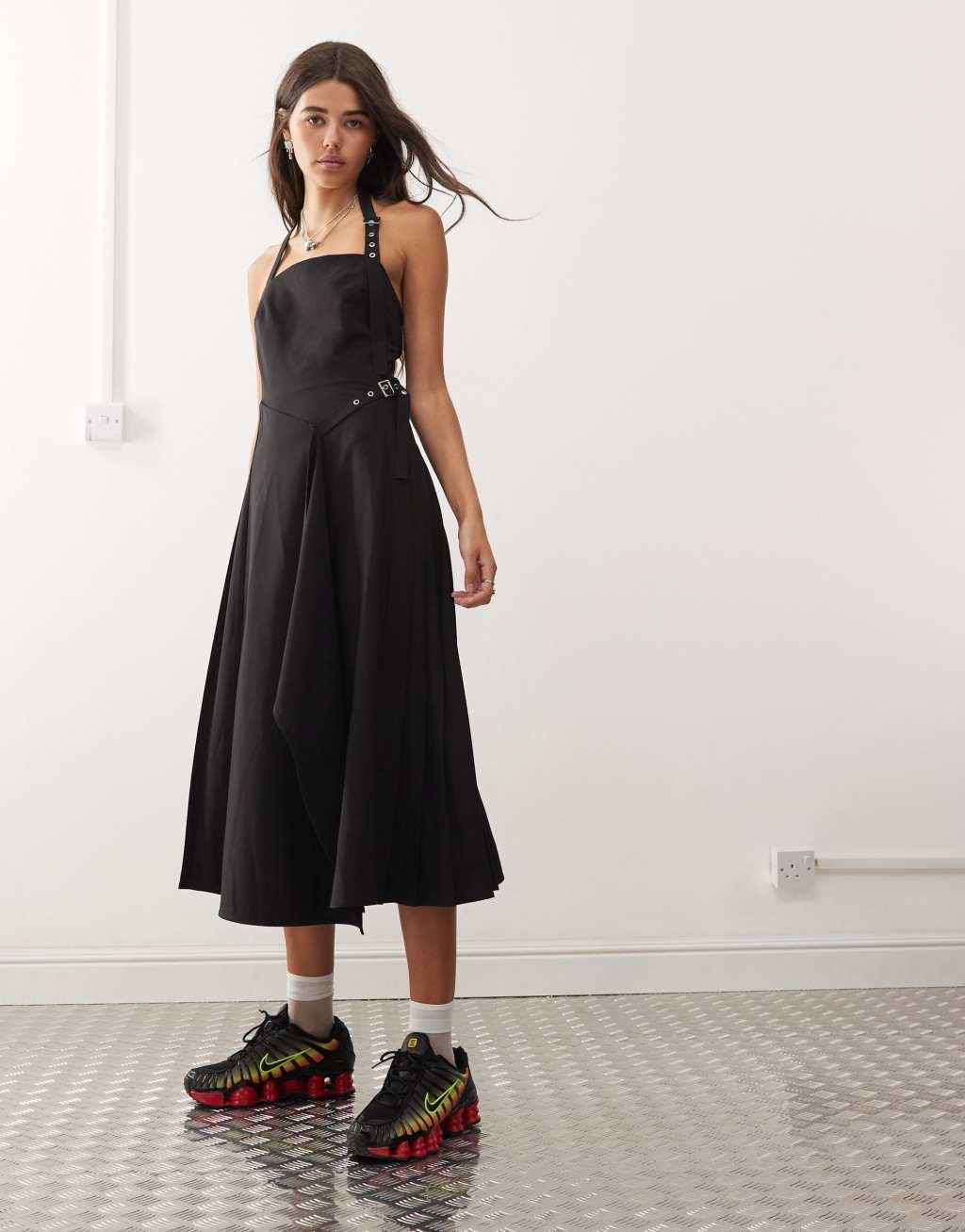 COLLUSION midi pinny dress with pleated hem and hardware detail in black Product Image