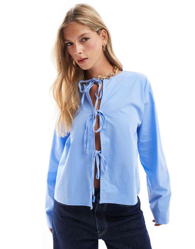 ASOS DESIGN poplin tie front long sleeve blouse in blue Product Image