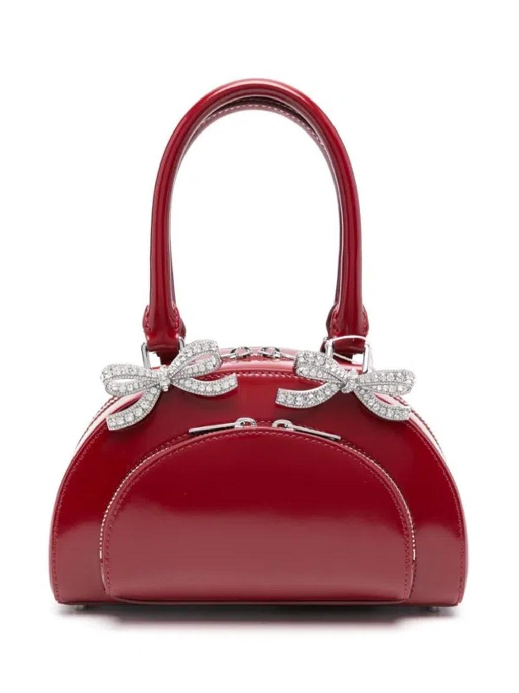 Womens Burgundy Bow-embellished Curved Leather Tote Bag In Red product image