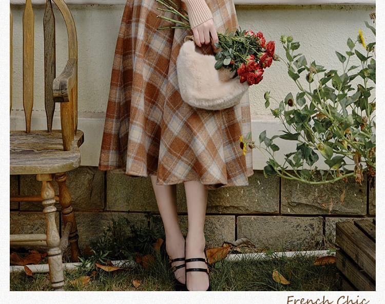 Set: Long-Sleeve Plain Knit Top + Stand Collar Button-Up Capelet + High Rise Plaid Midi A-Line Skirt Product Image