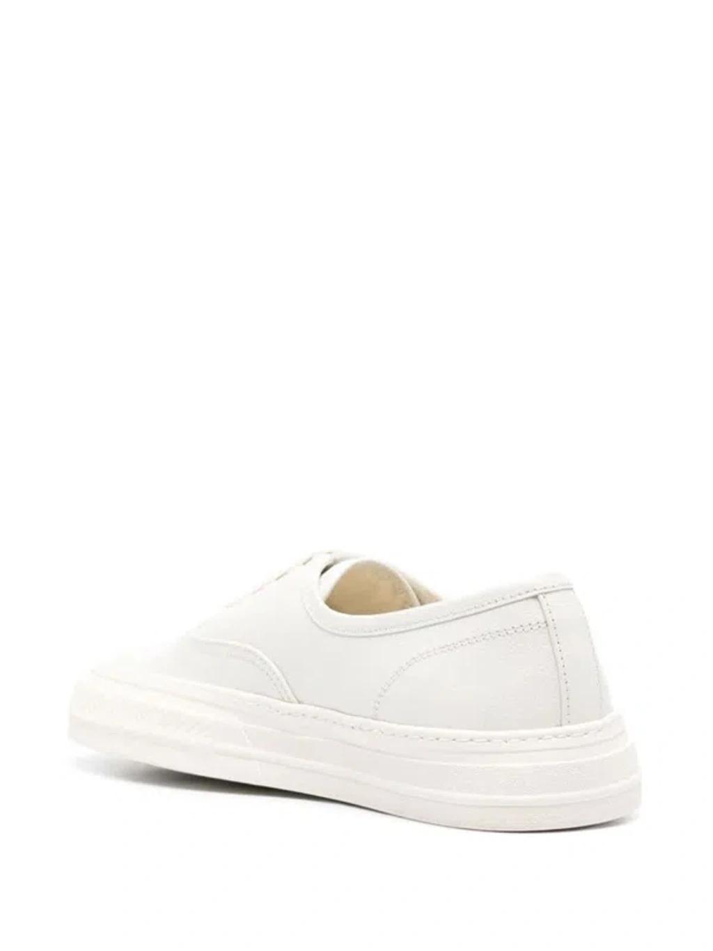 COMMON PROJECTS Four Hole Leather Sneaker In White Product Image