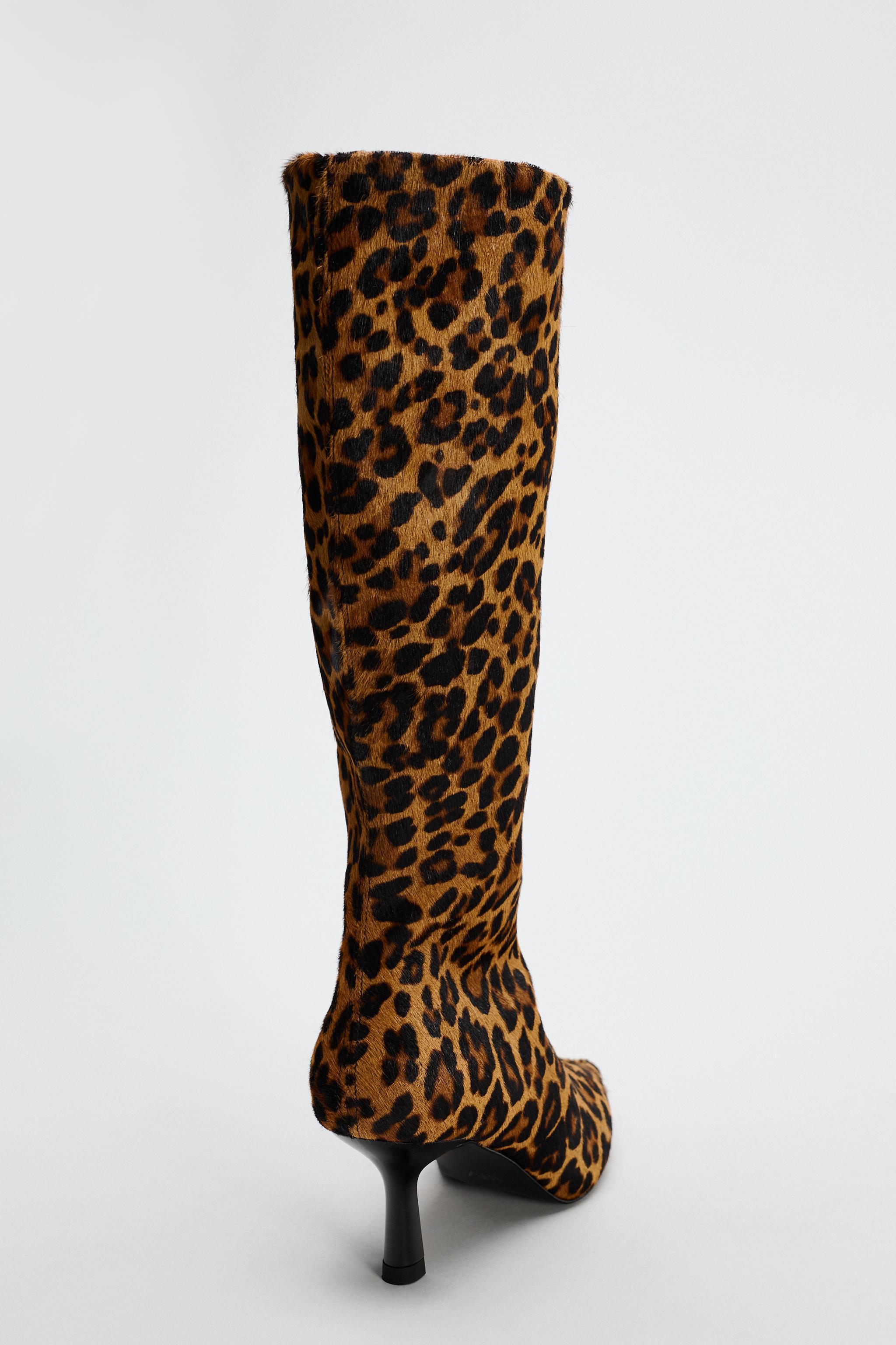 ANIMAL PRINT HEELED LEATHER BOOTS Product Image