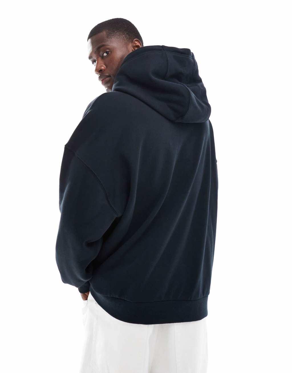 Nike Club french terry oversized hoodie in black Product Image