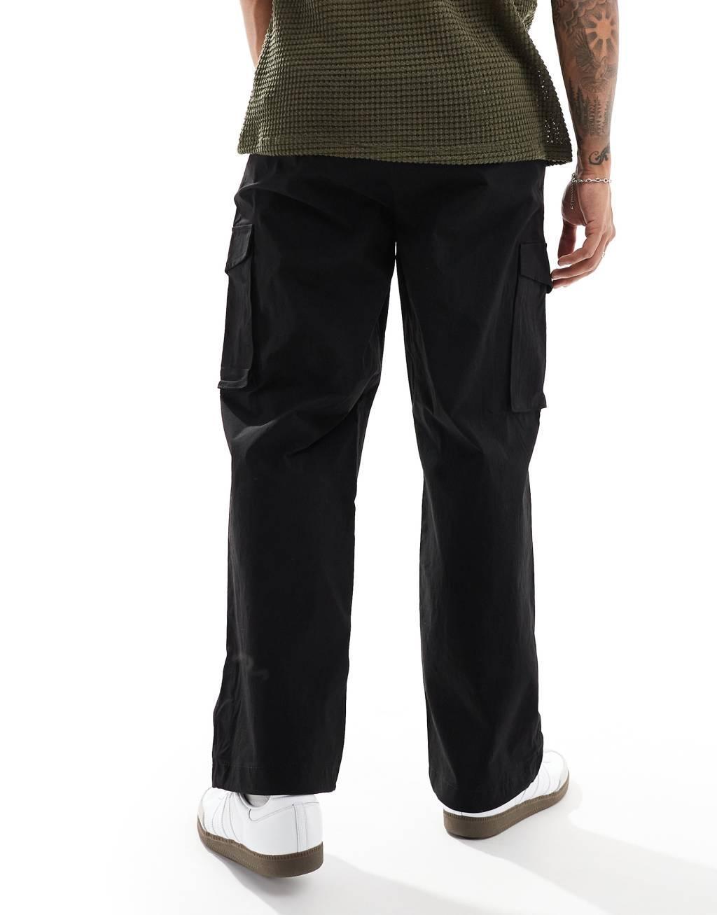 Jack & Jones bill drawstring wide fit tech cargo pants in black Product Image