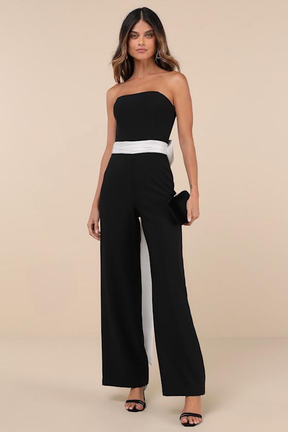 Sleek Perfection Black and White Strapless Bow Jumpsuit Product Image