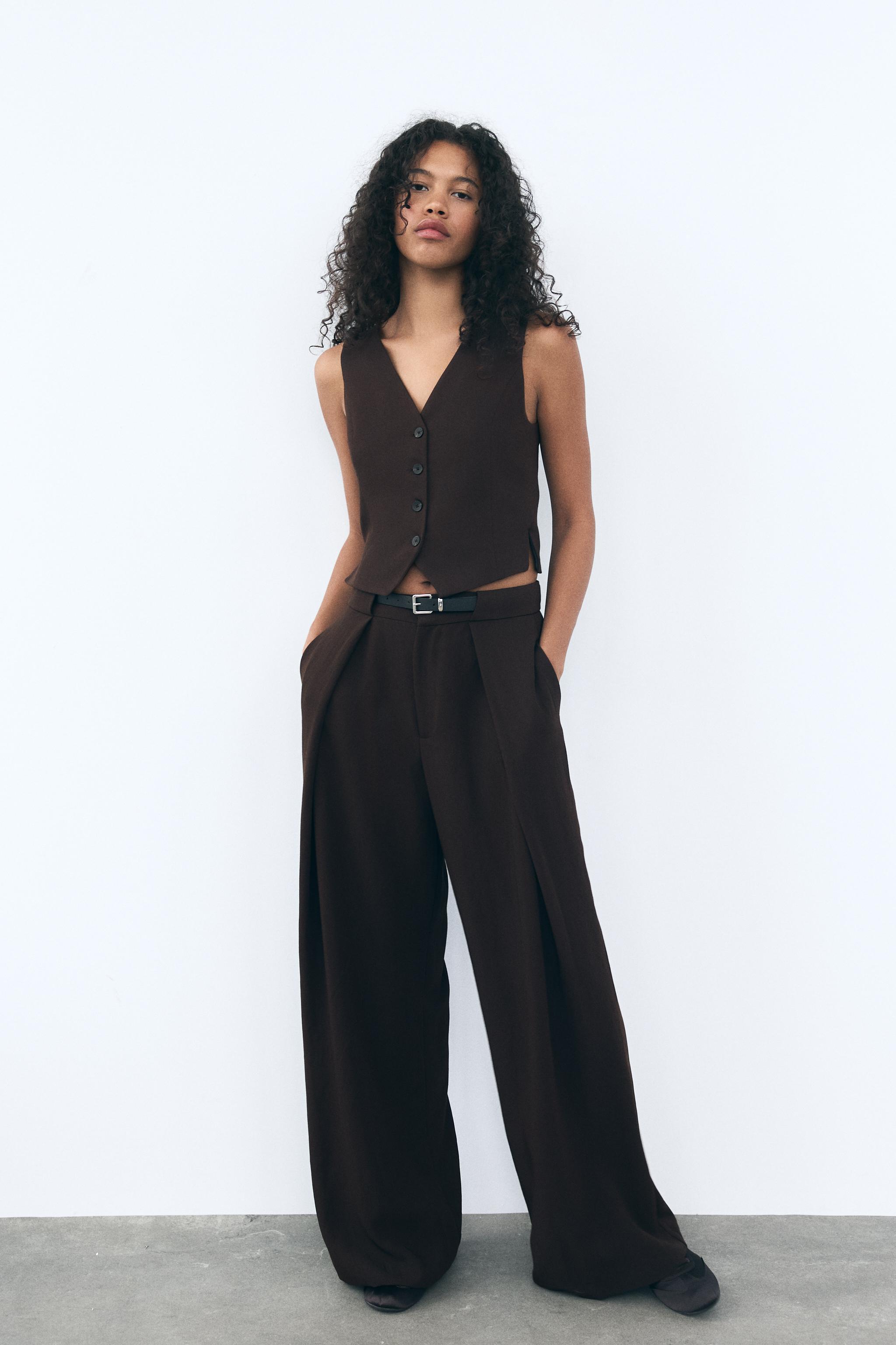 PLEATED PANTS WITH BELT Product Image