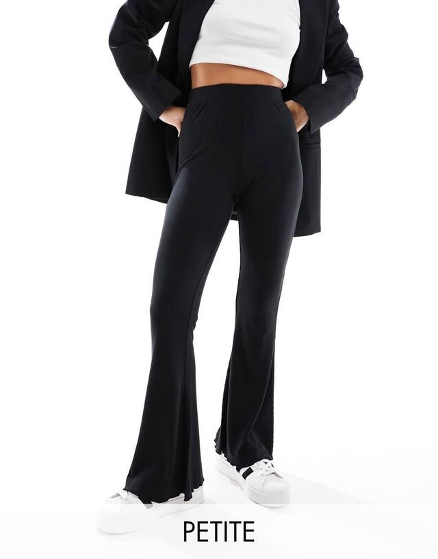 ASOS DESIGN Petite ribbed flare pants with lettuce hem in black Product Image