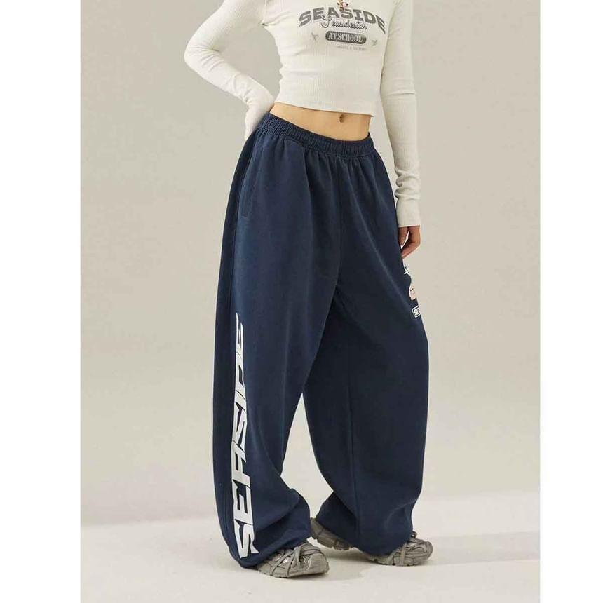 Low Waist Lettering Print Loose-Fit Wide-Leg Sweatpants Product Image