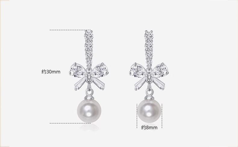 925 Sterling Silver Bow Faux Pearl Drop Earring Product Image