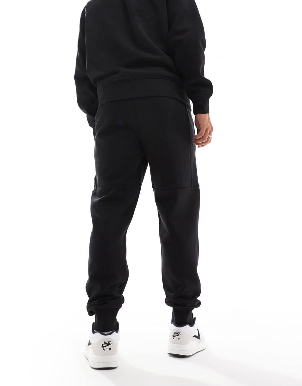 Nicce logo sweatpants in black Product Image