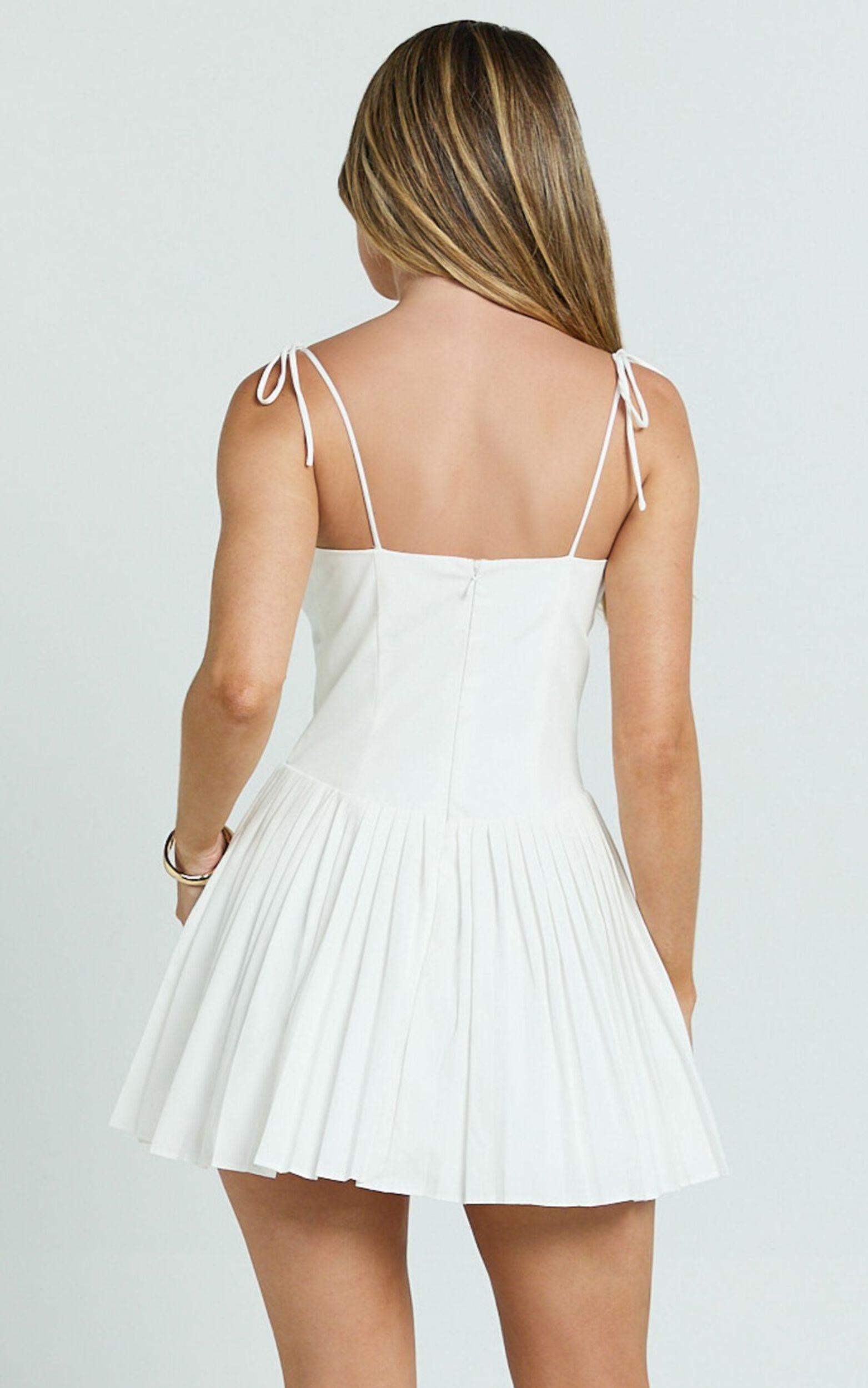 Nicolette Mini Dress - Square Neck Strappy Tie Shoulder Drop Waist Pleated Skirt Dress in Off White Product Image