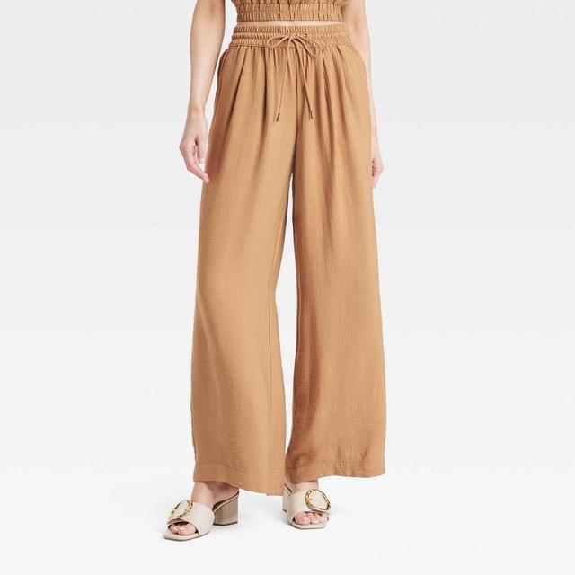 Womens High-Rise Modern Gauze Wide Leg Pull-On Pants - A New Day Tan XS Product Image