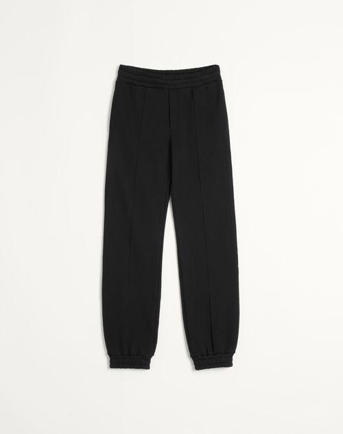 COTTON JOGGING PANTS WITH CHEZ VALENTINO PATCH Product Image