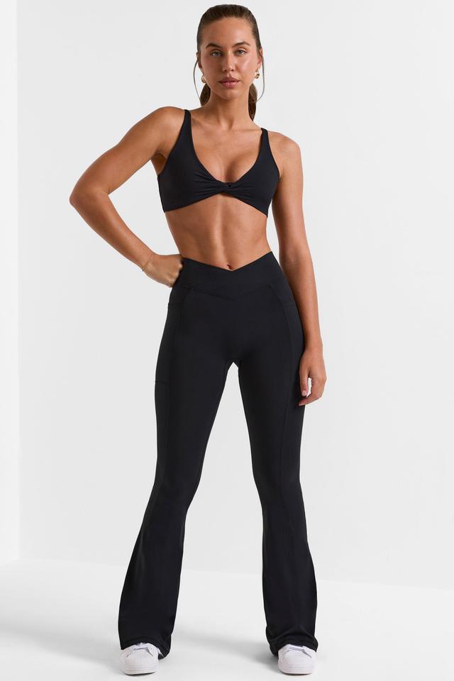 Soft Active Wrap Over Flared Leggings in Black Product Image