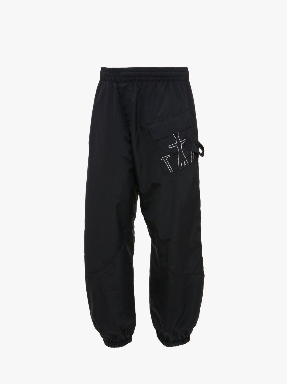 TWISTED JOGGERS WITH ANCHOR LOGO EMBROIDERY in black | JW Anderson US  Product Image