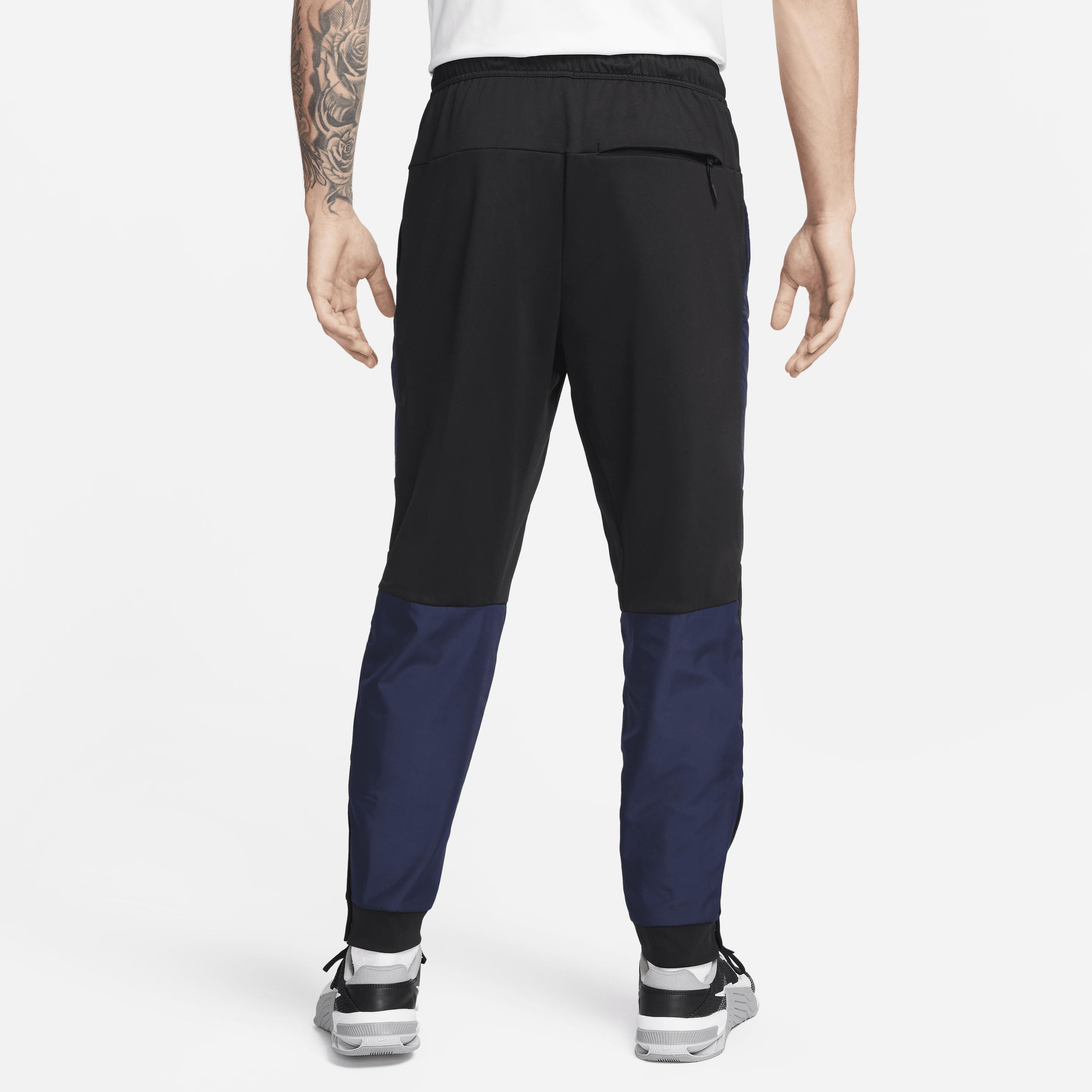 Nike Men's Unlimited Water-Repellent Zippered Cuff Versatile Pants Product Image