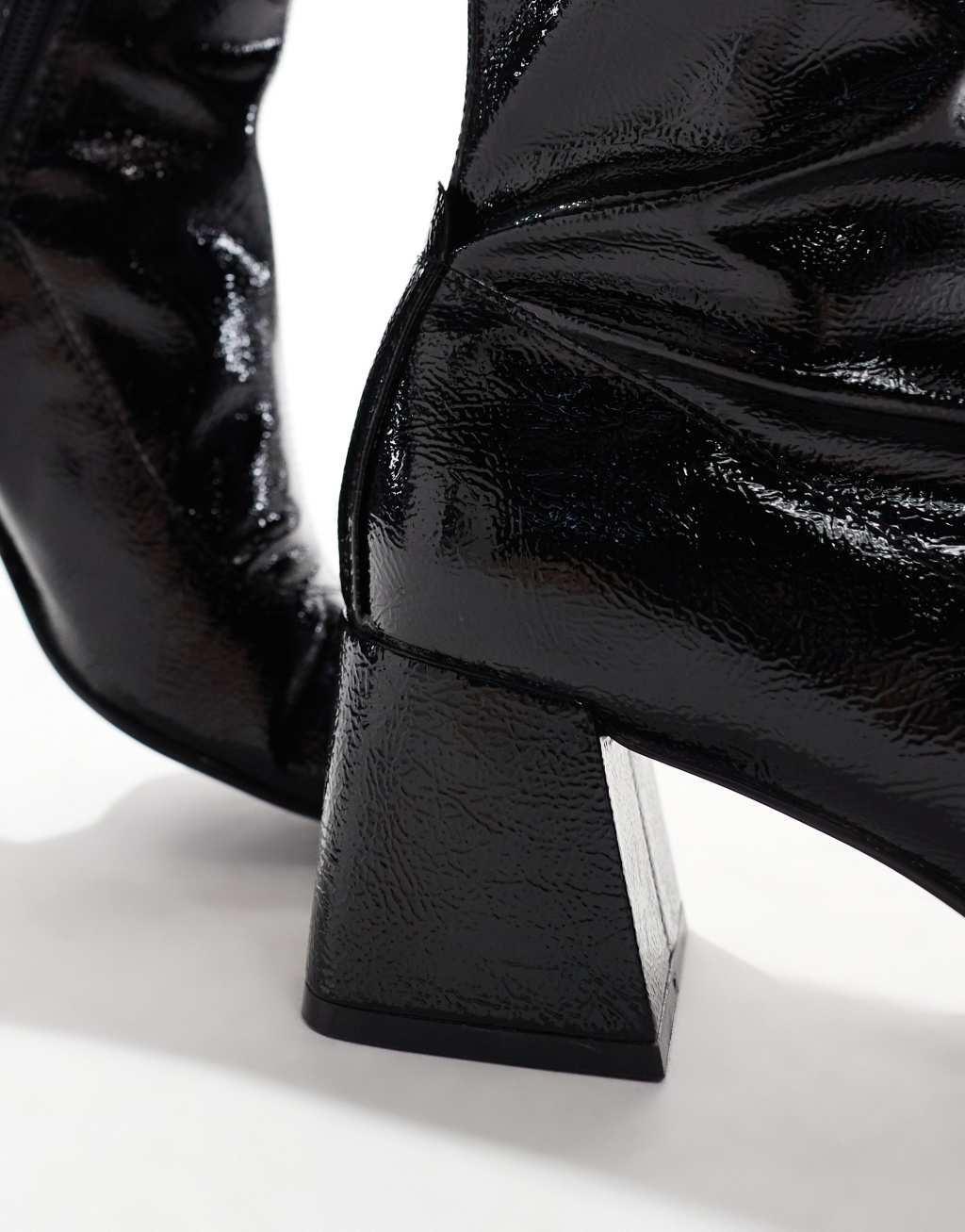 Stradivarius heeled boots in patent black Product Image