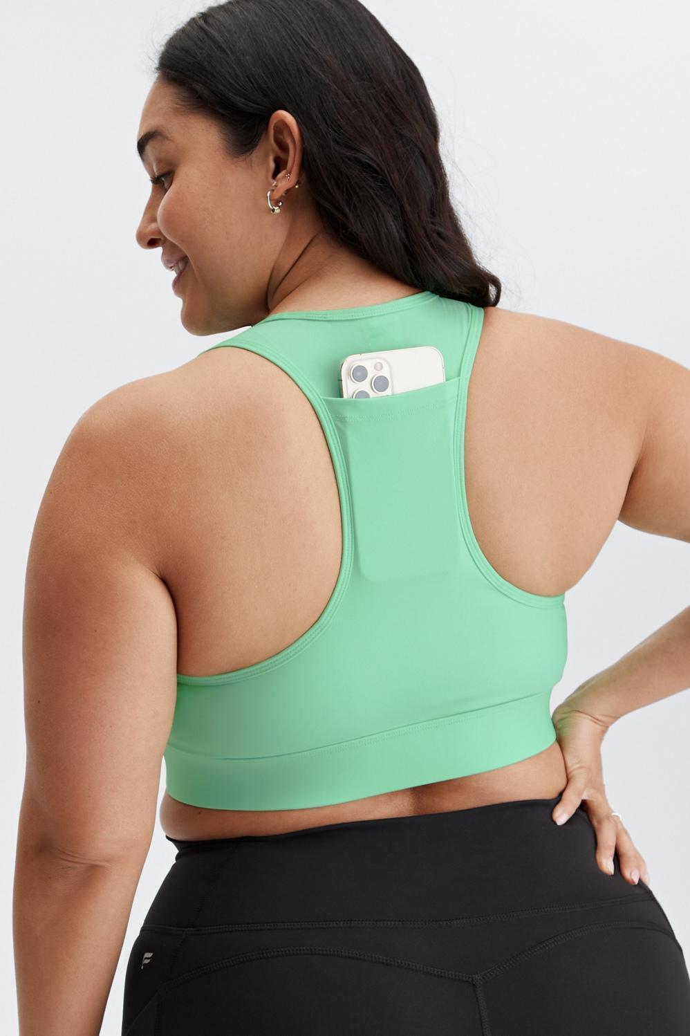 Fabletics On-the-Go Medium-Impact Sports Bra Womens green Size XXS Product Image