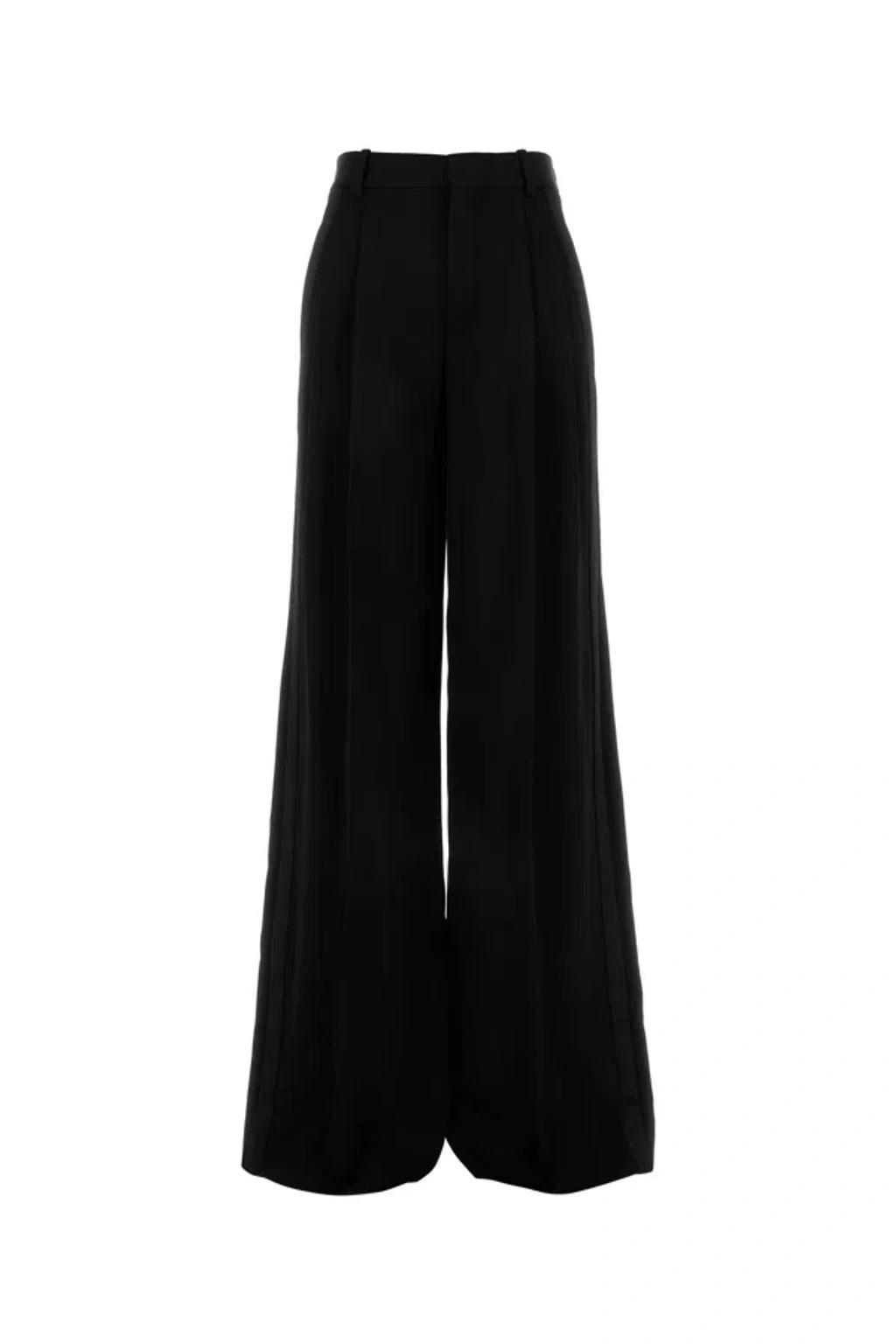 SAINT LAURENT Pleated Wool Slim-leg Pants In Black product image